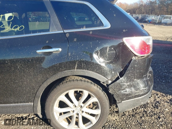 2011 Mazda CX-9 Grand Touring with VIN JM3TB3DV5B0322044, listed as a IAAI auction lot 40886500 with Not provided miles and . Bid and sale history available at DreamBid. Image 6.