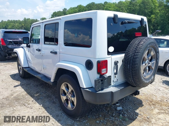 2018 Jeep Wrangler Unlimited Sahara with VIN 1C4BJWEG3JL805263, listed as a IAAI auction lot 42593276 with 96,489 mi miles and . Bid and sale history available at DreamBid. Image 3.