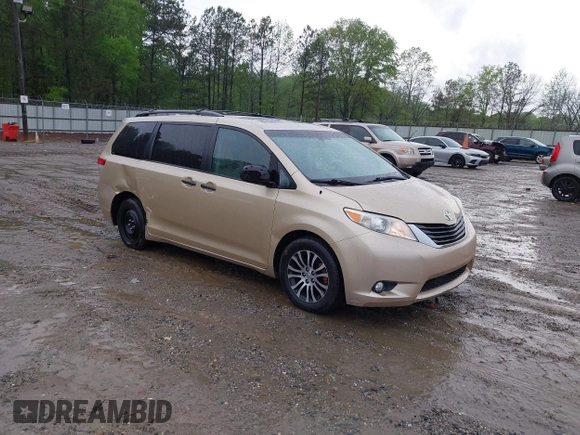 2014 Toyota Sienna XLE with VIN 5TDYK3DC1ES416999, listed as a IAAI auction lot 41972378 with 119,179 mi miles. Bid and sale history available at carsss.com. Image 1.
