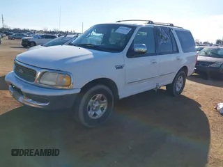 1998 Ford Expedition XLT with VIN 1FMRU1768WLA48604, listed as a IAAI auction lot 41642384 with 274,424 mi miles. Bid and sale history available at carsss.com. Image 2.