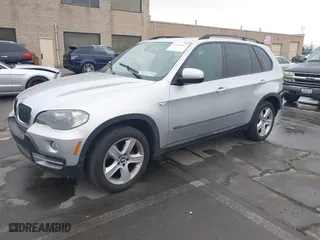 2007 BMW X5 3.0si with VIN 5UXFE43597L017476, listed as a IAAI auction lot 41459147 with 184,494 mi miles. Bid and sale history available at carsss.com. Image 2.