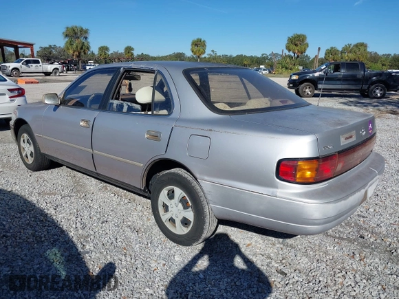 1994 Toyota Camry LE with VIN 4T1SK12E9RU351895, listed as a IAAI auction lot 41239573 with 184,866 mi miles. Bid and sale history available at carsss.com. Image 3.