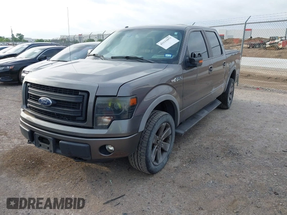 2014 Ford F-150 XL with VIN 1FTFW1EFXEKF21377, listed as a IAAI auction lot 42133053 with 99,924 mi miles and . Bid and sale history available at DreamBid. Image 2.