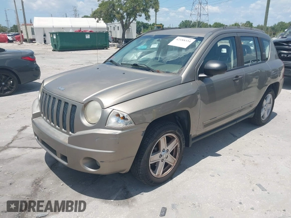 2008 Jeep Compass Sport with VIN 1J8FT47068D593407, listed as a IAAI auction lot 42188334 with 99,736 mi miles. Bid and sale history available at carsss.com. Image 2.