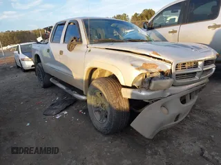 2004 Dodge Dakota SLT with VIN 1D7HL48N74S759634, listed as a IAAI auction lot 41224619 with 1 mi miles. Bid and sale history available at carsss.com. Image 1.