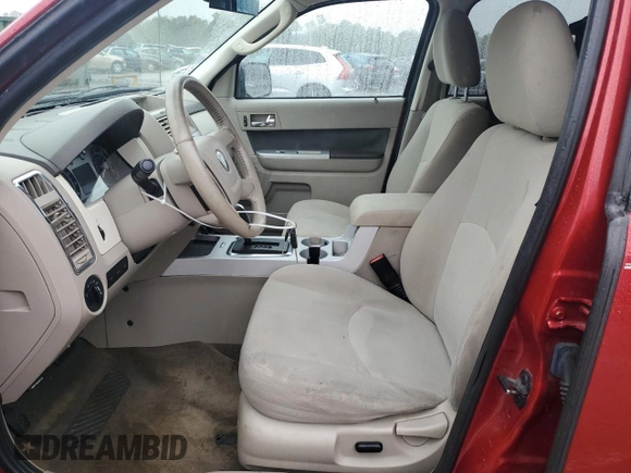 2009 Mercury Mariner with VIN 4M2CU91G69KJ15232, listed as a Copart auction lot 66601584 with 179,928 mi miles and Salvage title. Bid and sale history available at DreamBid. Image 7.