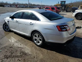 2015 Ford Taurus SE with VIN 1FAHP2D84FG149799, listed as a Copart auction lot 88993345 with 114,131 mi miles and Salvage Title. Bid and sale history available at DreamBid. Image 2.