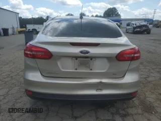 2018 Ford Focus SE with VIN 1FADP3F28JL292624, listed as a Copart auction lot 58960775 with 99,385 mi miles and Salvage title. Bid and sale history available at DreamBid. Image 6.