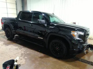 2020 GMC Sierra 1500 Elevation with VIN 3GTU9CED7LG141331, listed as a IAAI auction lot 40896421 with 61,608 mi miles. Bid and sale history available at carsss.com. Image 1.