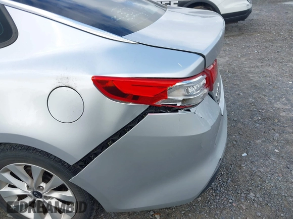 2018 Kia Optima EX with VIN 5XXGU4L34JG237557, listed as a IAAI auction lot 42000008 with 128,694 mi miles and . Bid and sale history available at carsss.com. Image 6.