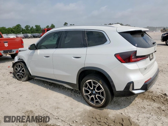 2023 BMW X1 xDrive28i with VIN WBX73EF06P5V77660, listed as a Copart auction lot 57342015 with 32,028 mi miles and Salvage title. Bid and sale history available at DreamBid. Image 2.