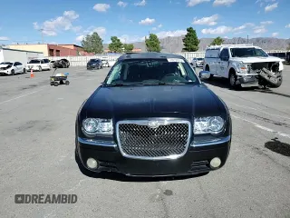 2009 Chrysler 300 with VIN 2C3KA63T69H626101, listed as a Copart auction lot 70259914 with 172,078 mi miles and Salvage Title. Bid and sale history available at carsss.com. Image 11.