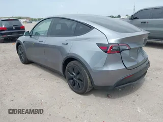 2025 Tesla Model Y Long Range with VIN 7SAYGDED5SF257258, listed as a IAAI auction lot 41877196 with 4,442 mi miles and . Bid and sale history available at DreamBid. Image 3.