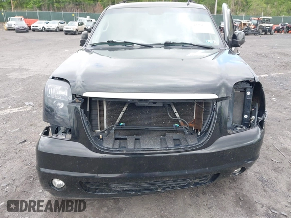 2007 GMC Yukon SLT z VIN 1GKFK13057R336128, wystawiony jako IAAI lot #42301778 z przebiegiem 153 227 mil mil oraz . Historia ofert i sprzedaży dostępna na DreamBid. Obrazek 6.