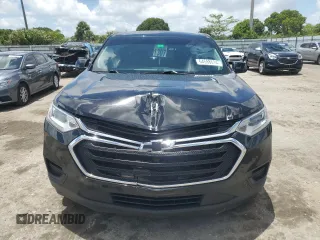 2020 Chevrolet Traverse LS with VIN 1GNERFKW4LJ188446, listed as a Copart auction lot 64598614 with 64,715 mi miles and Salvage Title. Bid and sale history available at carsss.com. Image 5.