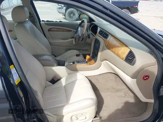 2003 Jaguar S-Type with VIN SAJEA01T93FM64497, listed as a IAAI auction lot 41804705 with 224,978 mi miles and . Bid and sale history available at DreamBid. Image 5.