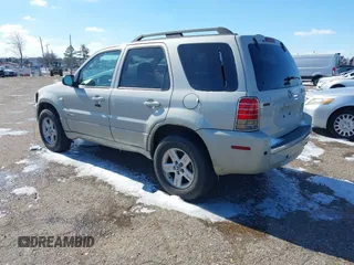 2007 Mercury Mariner with VIN 4M2CU39H07KJ20952, listed as a IAAI auction lot 41502938 with 148,622 mi miles and . Bid and sale history available at DreamBid. Image 3.
