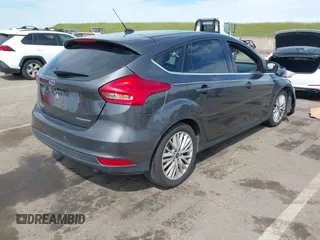 2018 Ford Focus Titanium with VIN 1FADP3N23JL241453, listed as a IAAI auction lot 42025190 with 90,174 mi miles and . Bid and sale history available at DreamBid. Image 4.