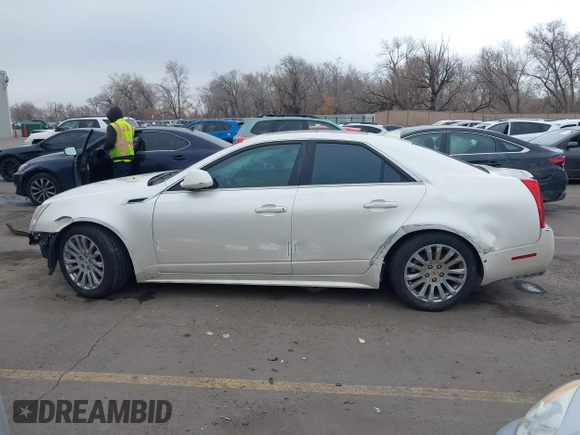 2011 Cadillac CTS Premium with VIN 1G6DS5ED9B0126691, listed as a IAAI auction lot 41407516 with 149,955 mi miles and . Bid and sale history available at carsss.com. Image 14.