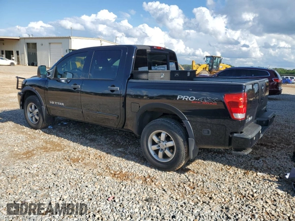 2012 Nissan Titan SV with VIN 1N6BA0EC6CN312465, listed as a Copart auction lot 58722815 with 186,207 mi miles and Salvage title. Bid and sale history available at DreamBid. Image 2.