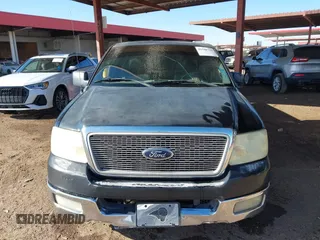 2005 Ford F-150 XLT with VIN 1FTPX12525NB25391, listed as a IAAI auction lot 41588721 with 241,743 mi miles. Bid and sale history available at carsss.com. Image 12.