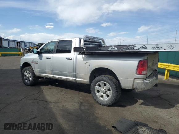 2014 Ram 2500 Big Horn with VIN 3C6UR5DL7EG141473, listed as a Copart auction lot 54074015 with 140,440 mi miles and Salvage title. Bid and sale history available at DreamBid. Image 2.