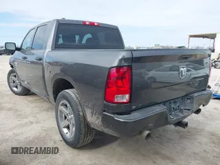 2014 Ram 1500 Express with VIN 1C6RR6KT2ES301959, listed as a IAAI auction lot 41619440 with 146,163 mi miles. Bid and sale history available at carsss.com. Image 3.