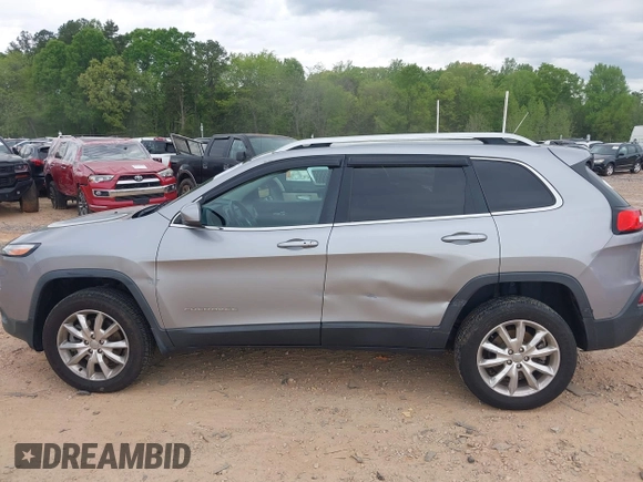 2015 Jeep Cherokee Limited with VIN 1C4PJMDS3FW706058, listed as a IAAI auction lot 41951302 with 163,404 mi miles. Bid and sale history available at carsss.com. Image 14.
