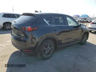 2021 Mazda CX-5 Touring with VIN JM3KFBCM8M0495899, listed as a Copart auction lot 51049235 with 31,164 mi miles and Salvage Title. Bid and sale history available at carsss.com. Image 3.
