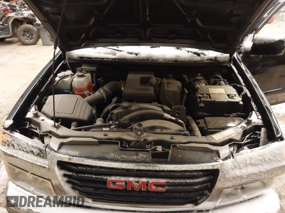 2009 GMC Canyon SLE1 with VIN 1GTDT13E698103718, listed as a IAAI auction lot 41581701 with 129,766 mi miles. Bid and sale history available at carsss.com. Image 10.