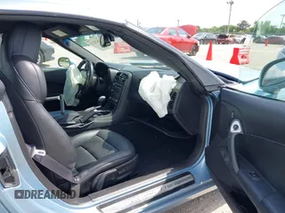 2012 Chevrolet Corvette 1LT with VIN 1G1YE2DW5C5102943, listed as a IAAI auction lot 42629221 with 66,979 mi miles and . Bid and sale history available at DreamBid. Image 5.