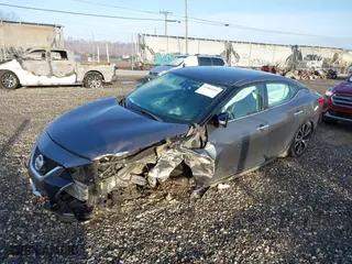2018 Nissan Maxima SV with VIN 1N4AA6AP7JC385725, listed as a IAAI auction lot 41483202 with 136,339 mi miles. Bid and sale history available at carsss.com. Image 18.