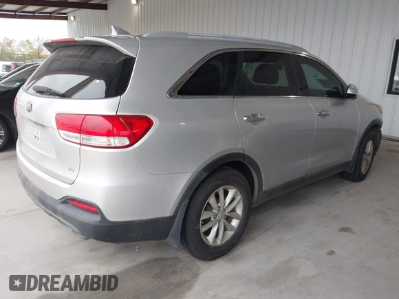2018 Kia Sorento LX with VIN 5XYPG4A55JG360565, listed as a IAAI auction lot 41031059 with 138,963 mi miles and . Bid and sale history available at DreamBid. Image 4.