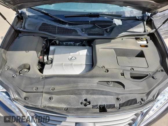 2015 Lexus RX 350 z VIN JTJZK1BA9F2426647, wystawiony jako Copart lot #63094795 z przebiegiem 77 790 mil mil oraz Szkoda całkowita • Salvage title. Historia ofert i sprzedaży dostępna na DreamBid. Obrazek 12.