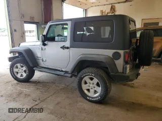 2013 Jeep Wrangler Sport with VIN 1C4GJWAG4DL559422, listed as a Copart auction lot 61454805 with 132,509 mi miles and Salvage title. Bid and sale history available at DreamBid. Image 2.