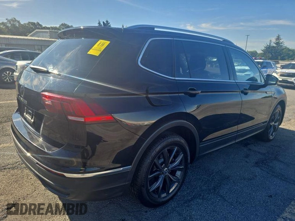 2024 Volkswagen Tiguan SE with VIN 3VV3B7AXXRM097540, listed as a IAAI auction lot 42809080 with 25,390 mi miles and . Bid and sale history available at DreamBid. Image 6.