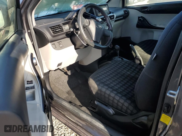 2013 Scion iQ with VIN JTNJJXB04DJ022845, listed as a Copart auction lot 73722044 with 25,108 mi miles and Salvage title. Bid and sale history available at DreamBid. Image 8.