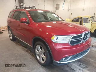 2014 Dodge Durango Limited z VIN 1C4RDJDG2EC370977, wystawiony jako IAAI lot #41872587 z przebiegiem 153 674 mil mil oraz . Historia ofert i sprzedaży dostępna na DreamBid. Obrazek 1.