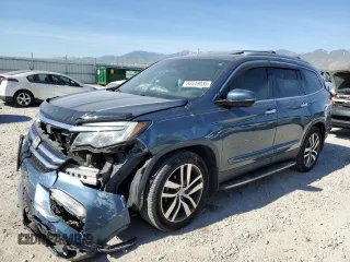 2017 Honda Pilot Elite with VIN 5FNYF6H06HB062024, listed as a Copart auction lot 57518035 with 126,603 mi miles and Salvage title. Bid and sale history available at DreamBid. Image 1.
