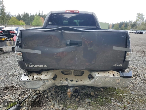 2012 Toyota Tundra 4WD Truck with VIN 5TFDY5F13CX263098, listed as a Copart auction lot 53458655 with 203,332 mi miles and Salvage Title. Bid and sale history available at carsss.com. Image 6.