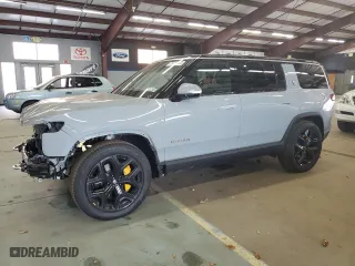2024 Rivian R1S Adventure with VIN 7PDSGABAXRN037937, listed as a Copart auction lot 76467184 with 18,283 mi miles and Salvage Title. Bid and sale history available at carsss.com. Image 1.