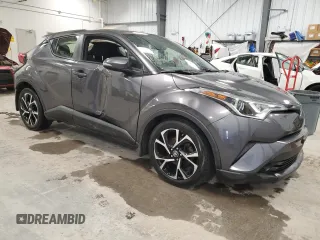 2019 Toyota C-HR XLE with VIN JTNKHMBX0K1035830, listed as a Copart auction lot 52561095 with 98,412 mi miles and Clean Title. Bid and sale history available at carsss.com. Image 4.