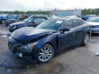 2015 Mazda 3 S Grand Touring z VIN JM1BM1W35F1238188, wystawiony jako IAAI lot #41206030 z przebiegiem 316 542 mil mil oraz . Historia ofert i sprzedaży dostępna na DreamBid. Obrazek 17.