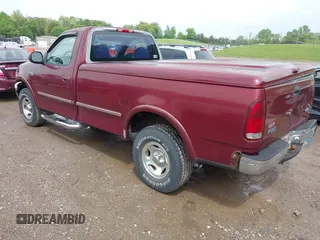 1997 Ford F-150 with VIN 1FTDF18W3VNA43627, listed as a IAAI auction lot 42132799 with 180,493 mi miles and . Bid and sale history available at DreamBid. Image 3.