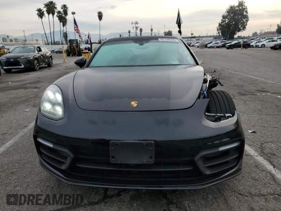 2022 Porsche Panamera z VIN WP0AJ2A79NL102055, wystawiony jako Copart lot #82739553 z przebiegiem 12 943 mil mil oraz . Historia ofert i sprzedaży dostępna na DreamBid. Obrazek 5.