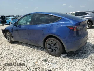 2024 Tesla Model Y Long Range with VIN 7SAYGAEE6RF196245, listed as a Copart auction lot 54667765 with 10,336 mi miles and Salvage title. Bid and sale history available at DreamBid. Image 2.