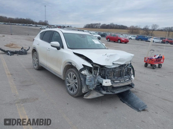 2023 Mazda CX-5 2.5 S Premium Plus Package with VIN JM3KFBEMXP0103278, listed as a IAAI auction lot 40954999 with 100,798 mi miles. Bid and sale history available at carsss.com. Image 18.