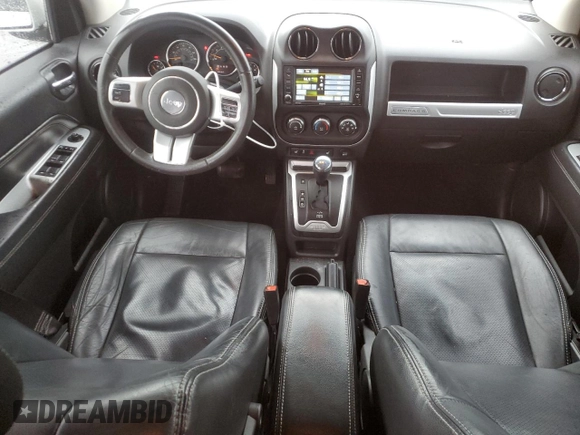 2015 Jeep Compass High Altitude Edition with VIN 1C4NJDEB2FD188994, listed as a Copart auction lot 83765504 with 124,134 mi miles and Salvage Title. Bid and sale history available at carsss.com. Image 8.