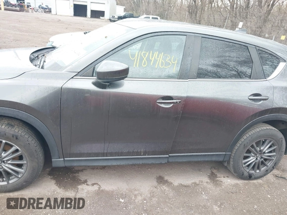 2017 Mazda CX-5 Touring with VIN JM3KFACL3H0148312, listed as a IAAI auction lot 41844634 with 68,534 mi miles and . Bid and sale history available at carsss.com. Image 14.