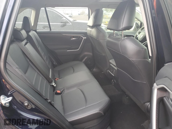 2024 Toyota RAV4 Hybrid XLE Premium with VIN JTMB6RFV4RD137902, listed as a Copart auction lot 86013364 with 9,330 mi miles and Salvage Title. Bid and sale history available at DreamBid. Image 11.